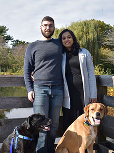 Vanita with husband and dogs