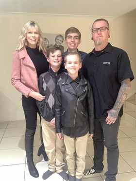 Alison Coombs, AFE Survivor with husband and 3 sons